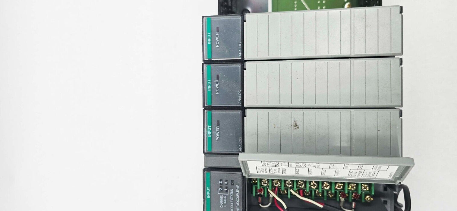 Allen-Bradley 1746-A13 SLC500 Chassis w/ 7 I/O Modules